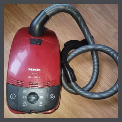 Miele vaccum on wood floor